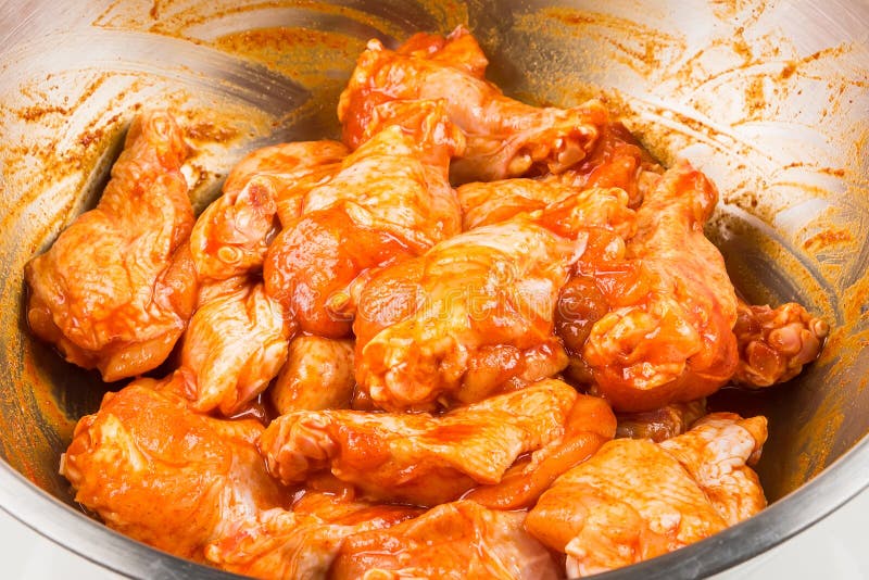 Mixing Chicken and Spicy Spice Powder . Making BBQ Chicken Legs Stock