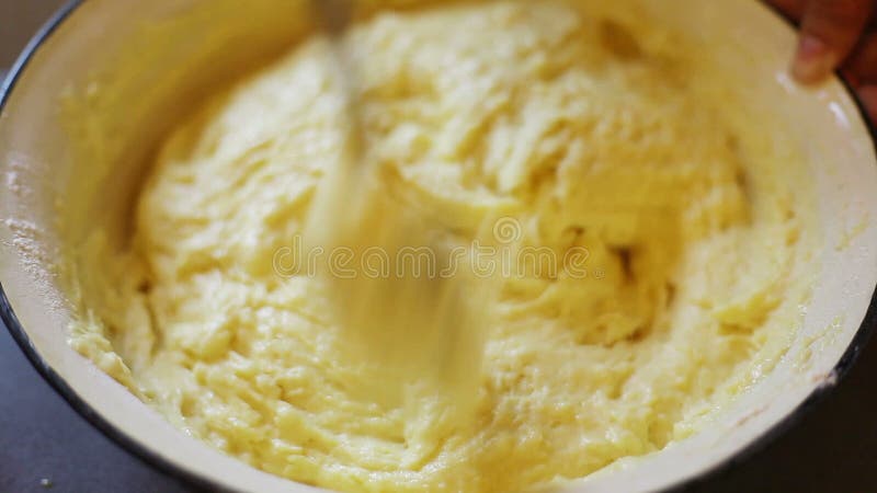 Mixing dough in a bowl