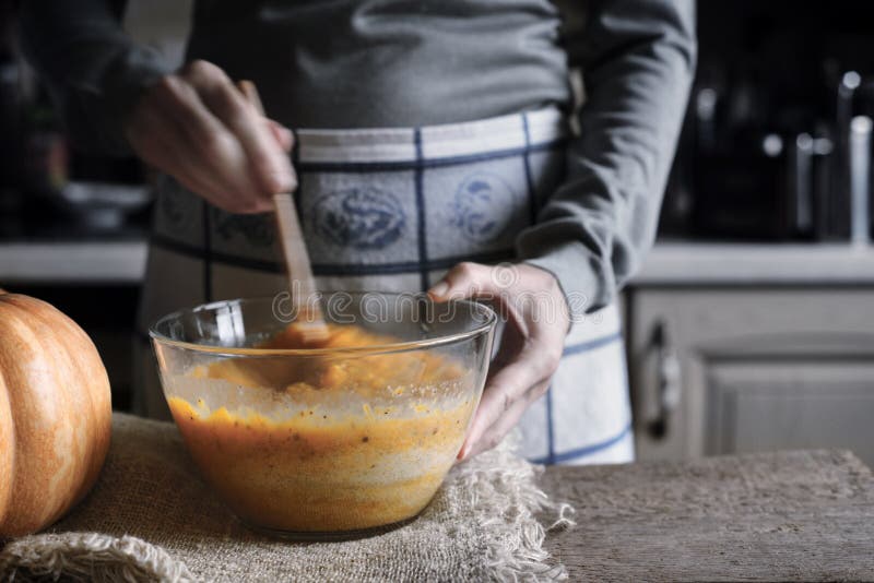 Mixing Dough for Pumpkin Dump Cake in the Glass Bowl Stock Image