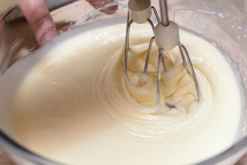 Mixing the Ingredients of Biscuit Dough with an Electric Mixer Stock