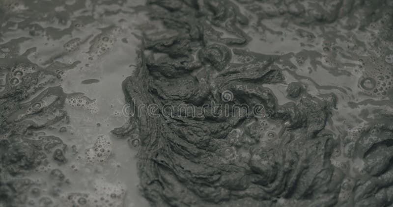 Mixing water in micro concrete plaster royalty free stock photography