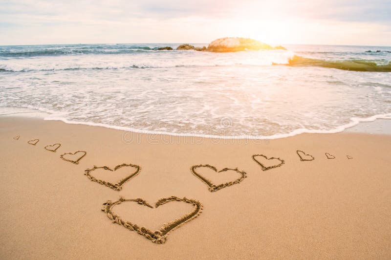 Miłości światła słonecznego serca plaża