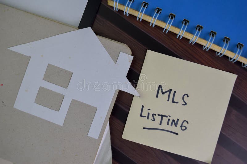 MLS Listing write on sticky notes isolated on Wooden Table