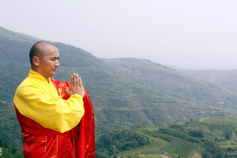 In the mountain depths, the monk in praying. In the mountain depths, the monk in praying