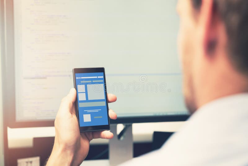Mobile app development - smart phone with application wireframe stock photo Mobile app development - smart phone with application wireframe stock photo