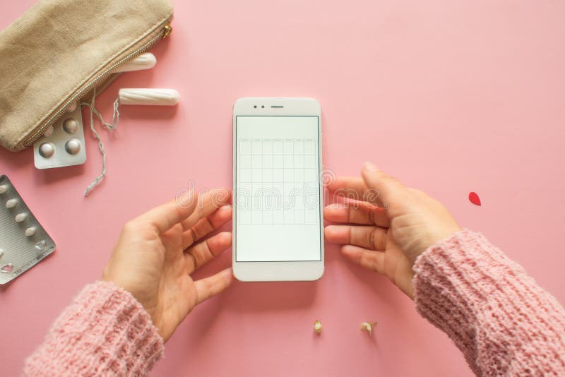 Mobile application to track your menstrual cycle and for marks. PMS and the critical days concept. stock photos