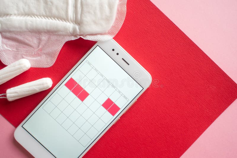 Mobile application to track your menstrual cycle and for marks. PMS and the critical days concept. royalty free stock photography