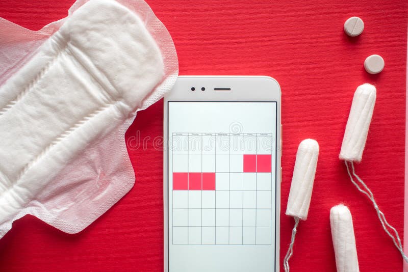Mobile application to track your menstrual cycle and for marks. PMS and the critical days concept. royalty free stock photography