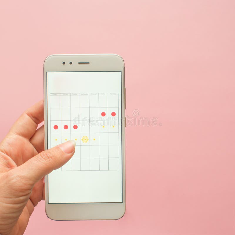 Mobile application to track your menstrual cycle and for marks. PMS and the critical days concept. royalty free stock photo