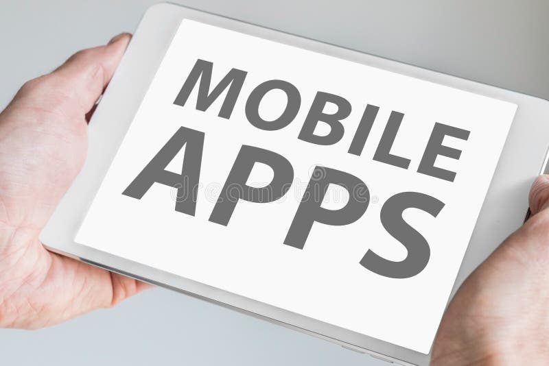 Mobile apps text displayed on touchscreen of modern tablet or smart device. Concept for development of applications for mobile de royalty free stock photos Mobile apps text displayed on touchscreen of modern tablet or smart device. Concept for development of applications for mobile de royalty free stock photos
