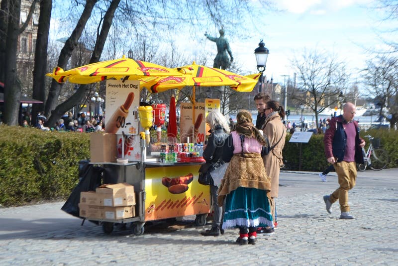 Mobile cart with street food. STOCKHOLM, SWEDEN - APRIL 19, 2015: Mobile cart with street food on street of Stockholm stock images Mobile cart with street food. STOCKHOLM, SWEDEN - APRIL 19, 2015: Mobile cart with street food on street of Stockholm stock images