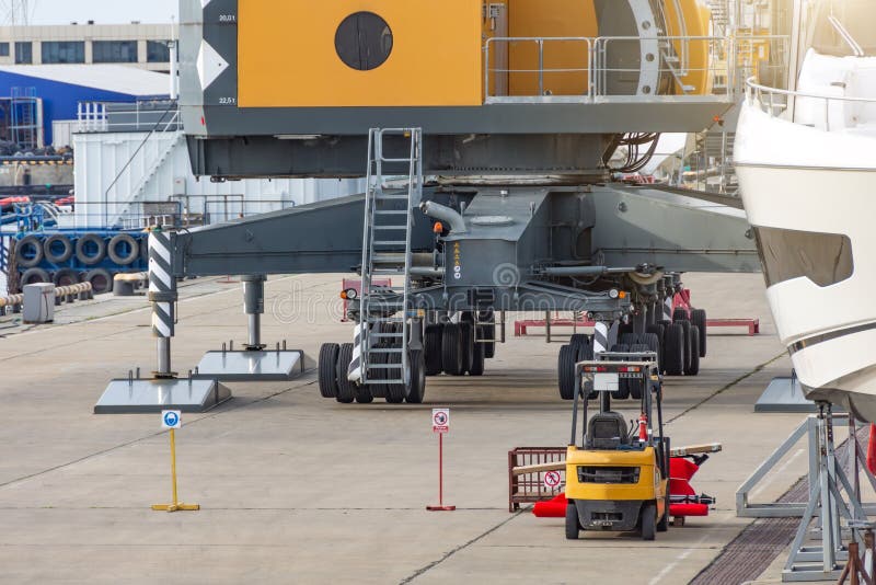 Mobile Crane Cargo Crane Supports in the Docks of the Seaport and