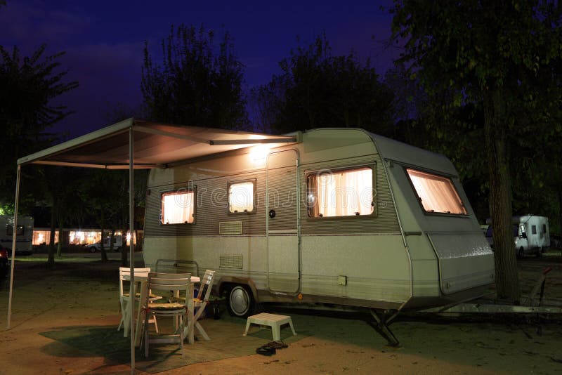 Mobile home on a camping site royalty free stock images