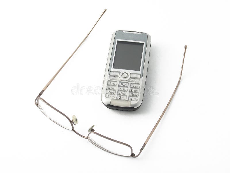 Mobile phone and glasses stock image. Image of glasses 180439