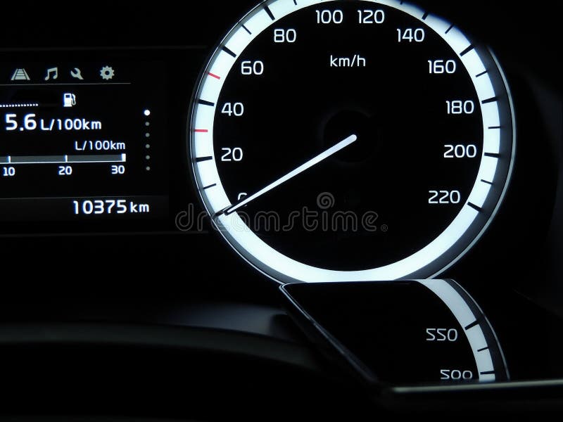 Speedometer Reflections on the Glass Surface of Mobile Phone in Vehicle