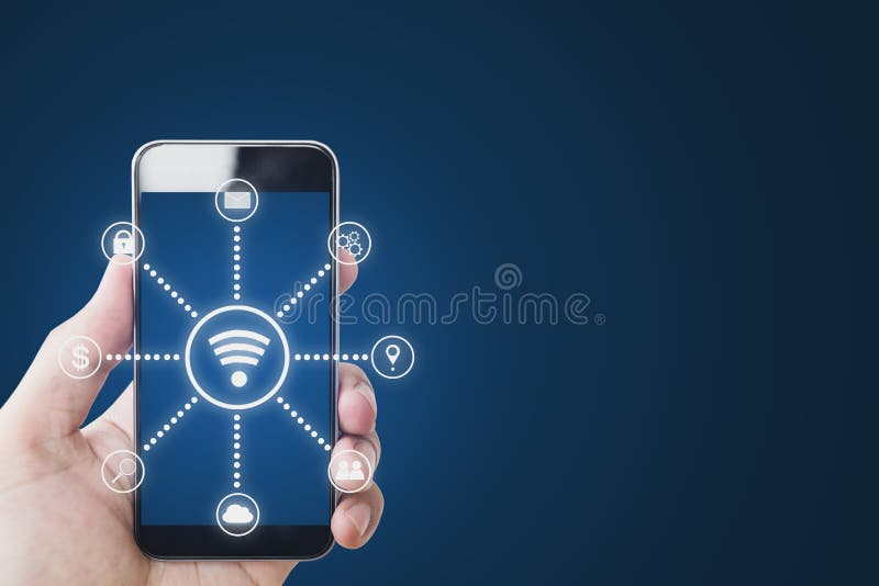 Mobile phone Internet wireless and application technology. Hand holding mobile smart phone and WiFi and application icons royalty free stock photos