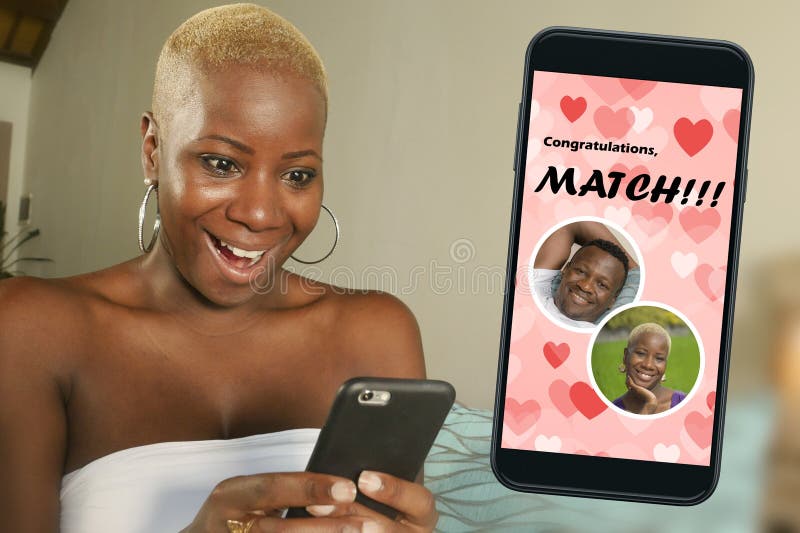 Mobile phone and young beautiful and happy black afro American woman using online dating app excited in match with a handsome guy