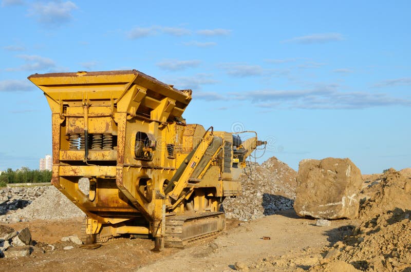 Mobile Stone Crusher Machine by the Construction Site or Mining Quarry for  Crushing Old Concrete Slabs into Gravel and Subsequent Stock Photo - Image  of building, grit: 160731118