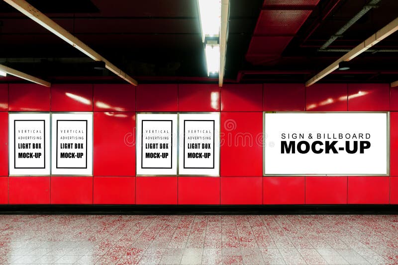 Mock up blank light box and billboard at metro station royalty free stock photography