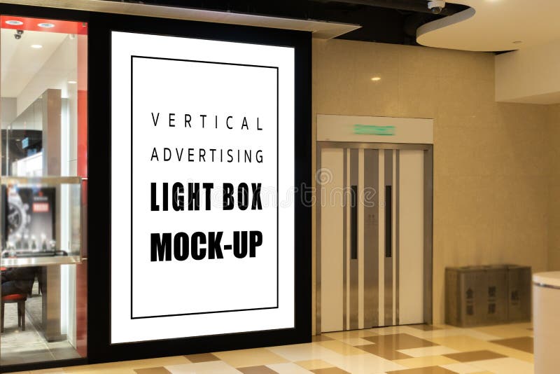 Mock up blank vertical light box at modern building royalty free stock image