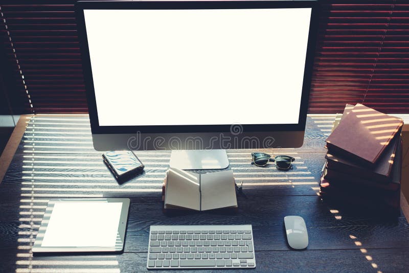 Mock up of home desktop with pc computer and digital tablet with blank copy space screen for your promotional content, keyboard wi stock image