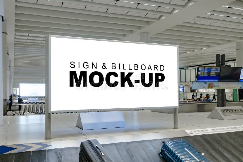 Mock up large blank horizontal billboard at baggage claim point stock photography