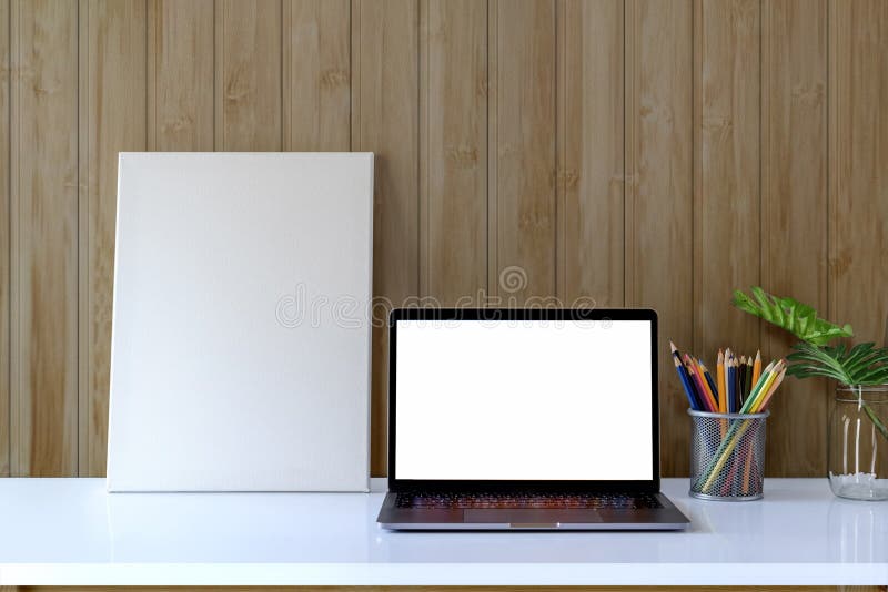 Mock up photo frame with laptop and supplies. stock image Mock up photo frame with laptop and supplies. stock image
