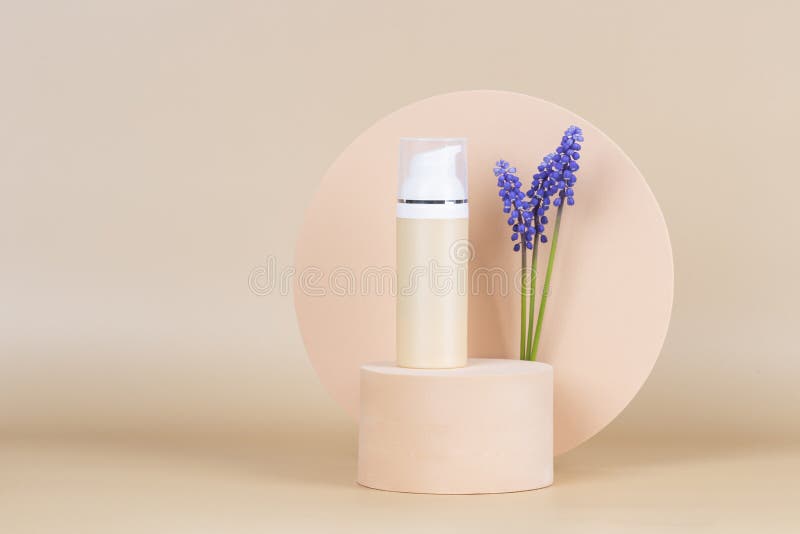 Blank container for gel, CC, BB, face cream toner, make up foundation and geometric podium platform on beige background