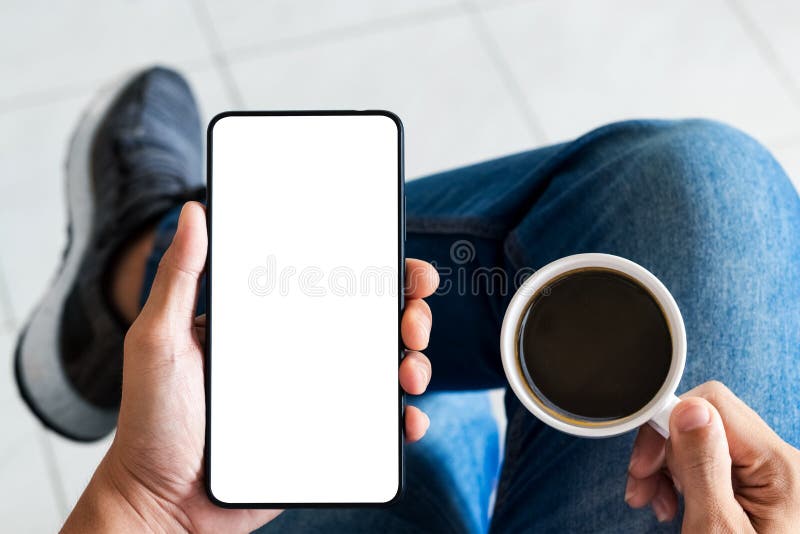 Mockup copy space phone, man`s hand holding smartphone with blank white copy screen.