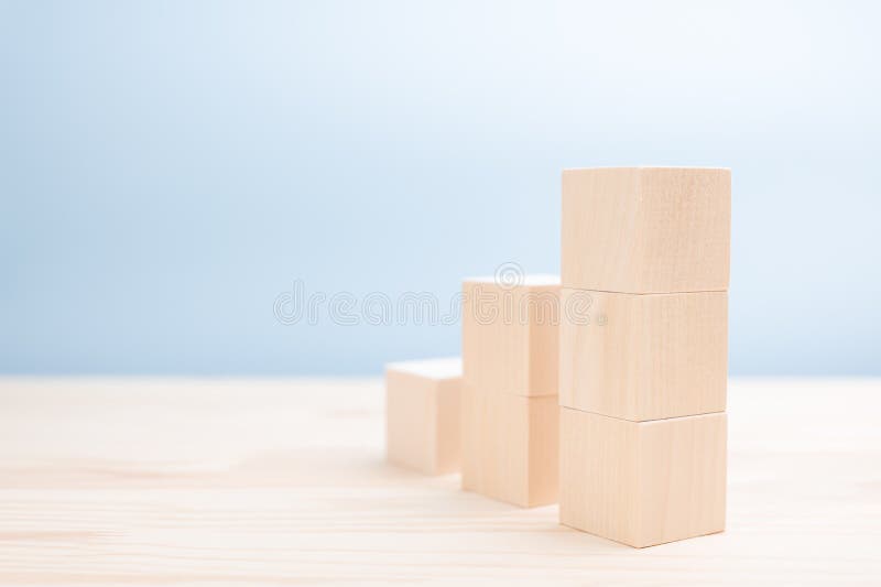 Mockup image. Ladder of wooden cubes for icons, symbols, or text. Business and design concept. Stairs made of wooden blocks stock images