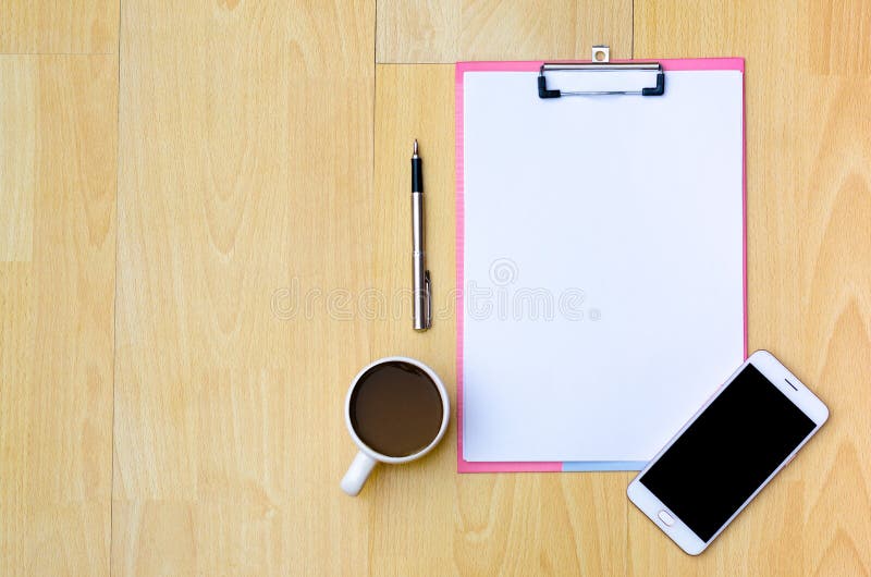mockup phone Coffee cups, earphones Note paper Placed on a wooden top view royalty free stock image mockup phone Coffee cups, earphones Note paper Placed on a wooden top view royalty free stock image