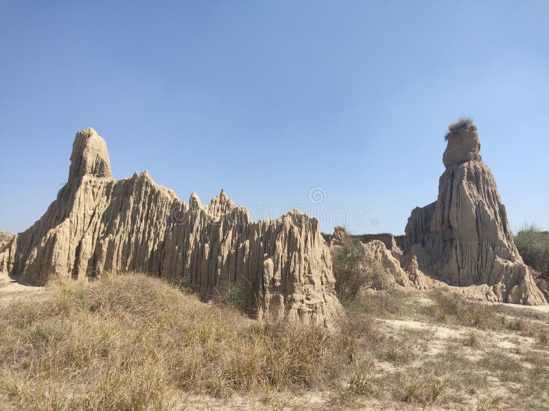 Modderkanyonen gevormd door bodemerosie stock fotografie