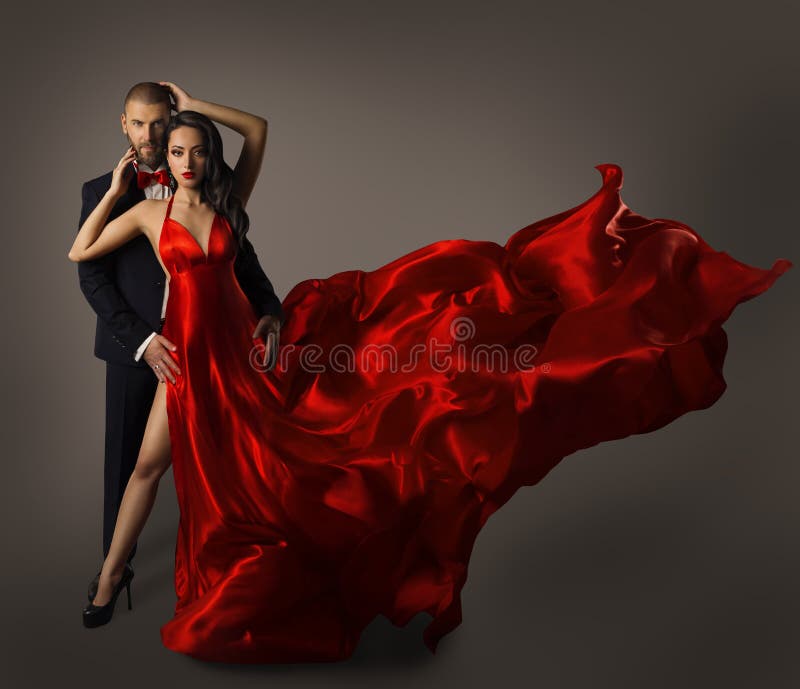 Mode-Paar-Porträt, Frauen-rotes Kleid, Mann im Anzug, langer Stoff