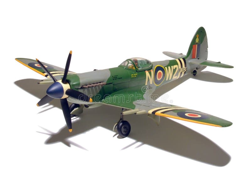 An assembled and painted model of a Supermarine Spitfire Mk 24 fighter plane - isolated with its shadow over pure white. An assembled and painted model of a Supermarine Spitfire Mk 24 fighter plane - isolated with its shadow over pure white.