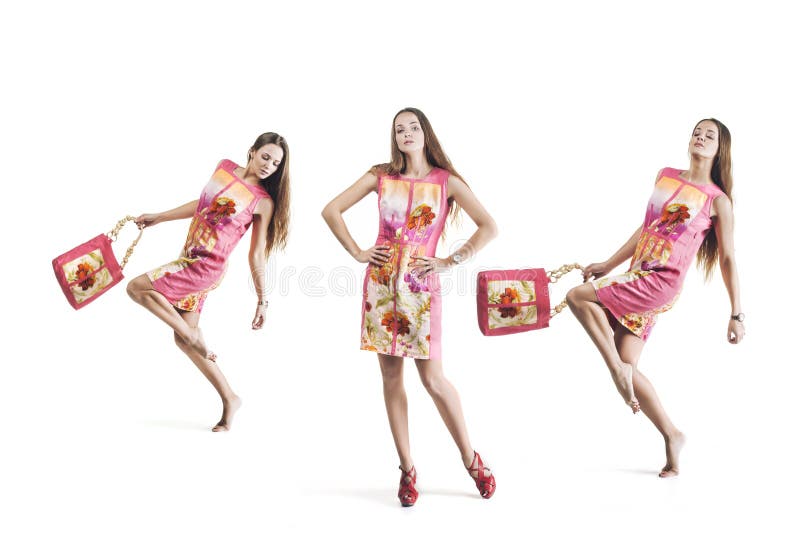 Model beautiful women in bright dresses in full length on white stock images Model beautiful women in bright dresses in full length on white stock images