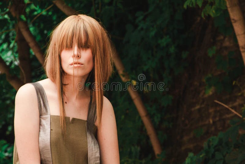 Model with a Creative Haircut in the Woods Stock Photo Image of vogue