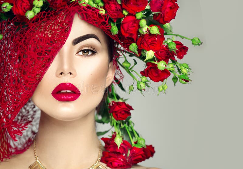 Model girl with red roses flower wreath and fashion makeup. Flowers hairstyle