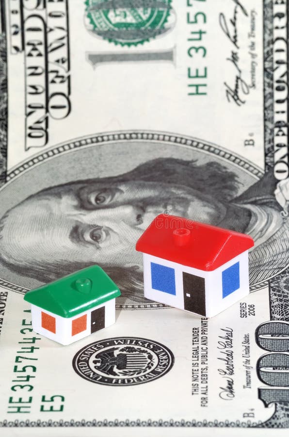 Model huizen, dollarbankbiljet stock foto Model huizen, dollarbankbiljet stock foto