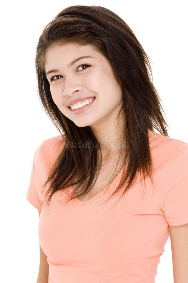 A cute young asian woman in a pastel orange top on white background. A cute young asian woman in a pastel orange top on white background