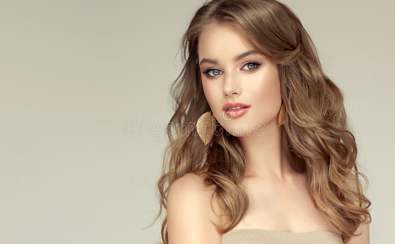 Young, Blonde Haired Beautiful Model with Long, Well Groomed Hair, Dressed  in Golden Earrings. Perfect Freely Laying Hairstyle. Stock Image - Image of  curly, hairdressing: 154726519