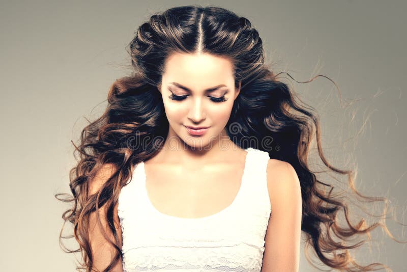 Model with long hair. Waves Curls Hairstyle. Hair Salon. Updo. F royalty free stock photo Model with long hair. Waves Curls Hairstyle. Hair Salon. Updo. F royalty free stock photo