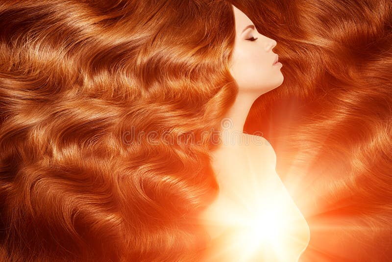 Model with long red hair. Waves Curls Hairstyle. Hair Salon. Updo. Fashion model with shiny hair. Woman with healthy hair girl wi royalty free stock images Model with long red hair. Waves Curls Hairstyle. Hair Salon. Updo. Fashion model with shiny hair. Woman with healthy hair girl wi royalty free stock images