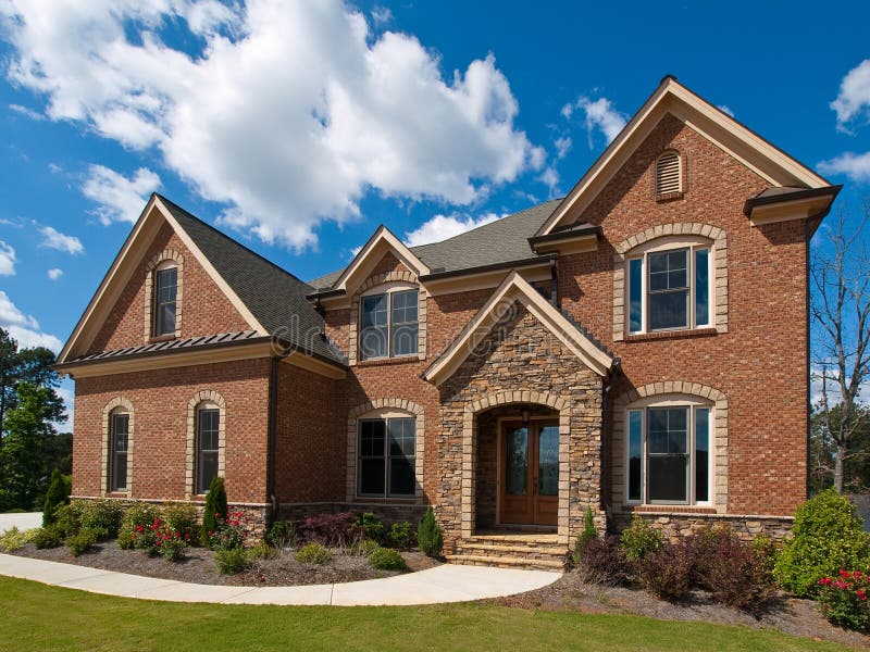 Model Luxury Home Exterior clouds side view royalty free stock images Model Luxury Home Exterior clouds side view royalty free stock images