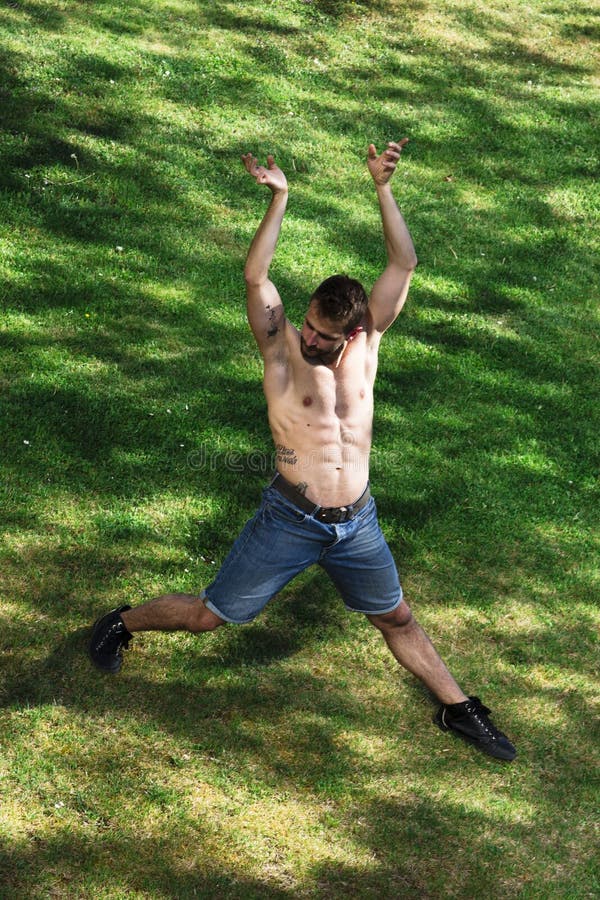 Model Man with Naked Torso Dancing in Nature Stock Photo - Image of model,  nature: 153194510