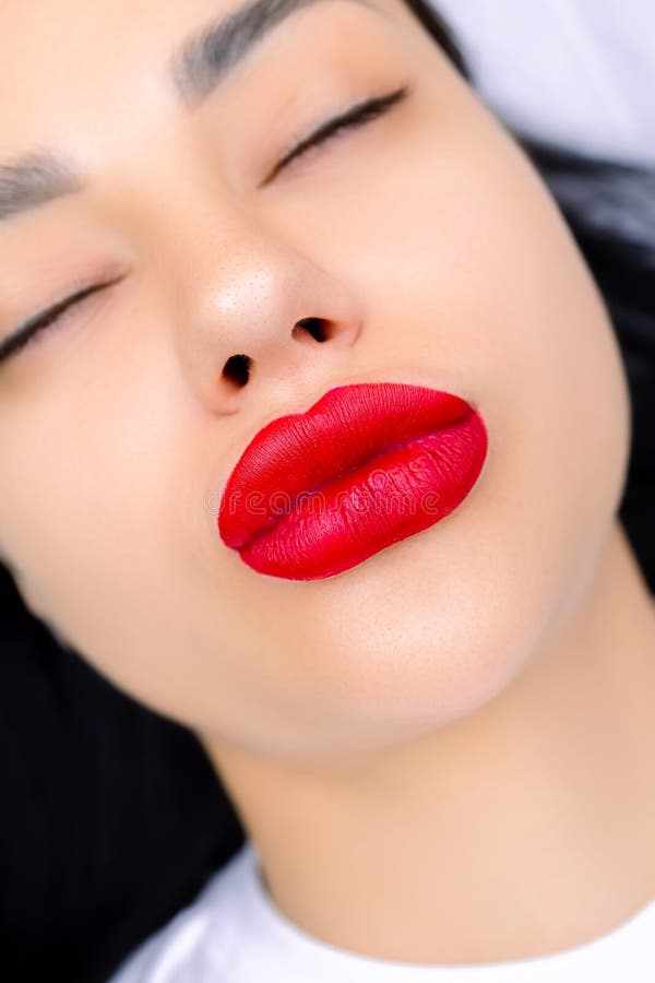 Model with Red Lips Pursed Her Lips in a Kiss Stock Image Image of