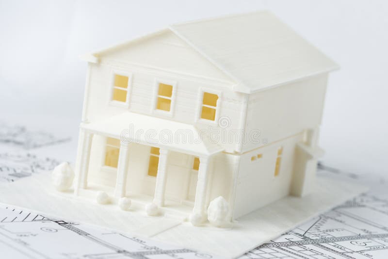 Model of the family house printed on a 3D printer. Model of the family house printed on a 3D printer.