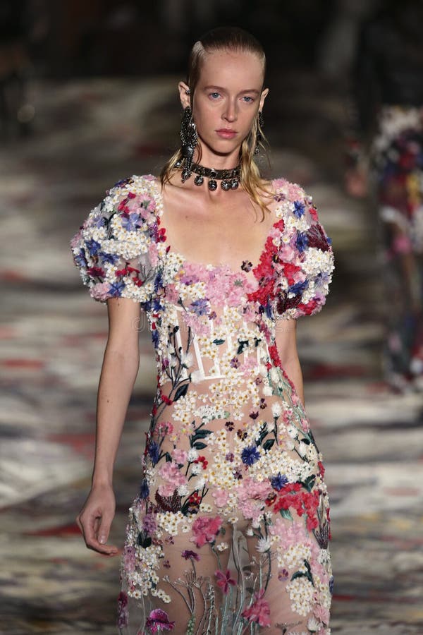 A Model Walks the Runway during the Alexander McQueen Designed by Sarah ...