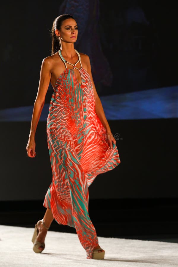 A Model Walks Runway in Designer Swim Apparel during the Caffe Swimwear ...