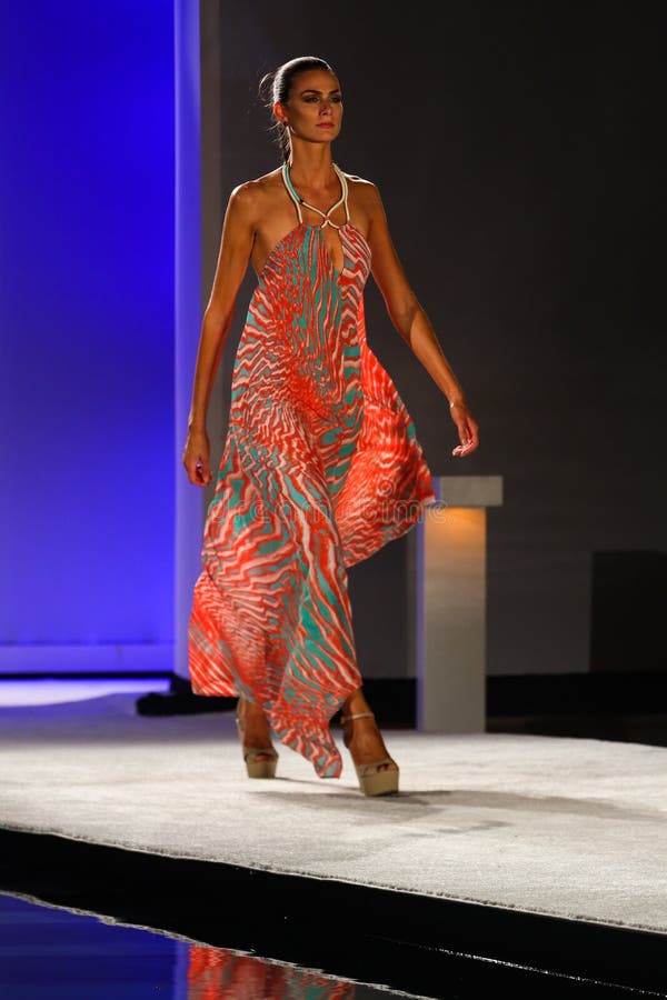 A Model Walks Runway in Designer Swim Apparel during the Caffe Swimwear ...