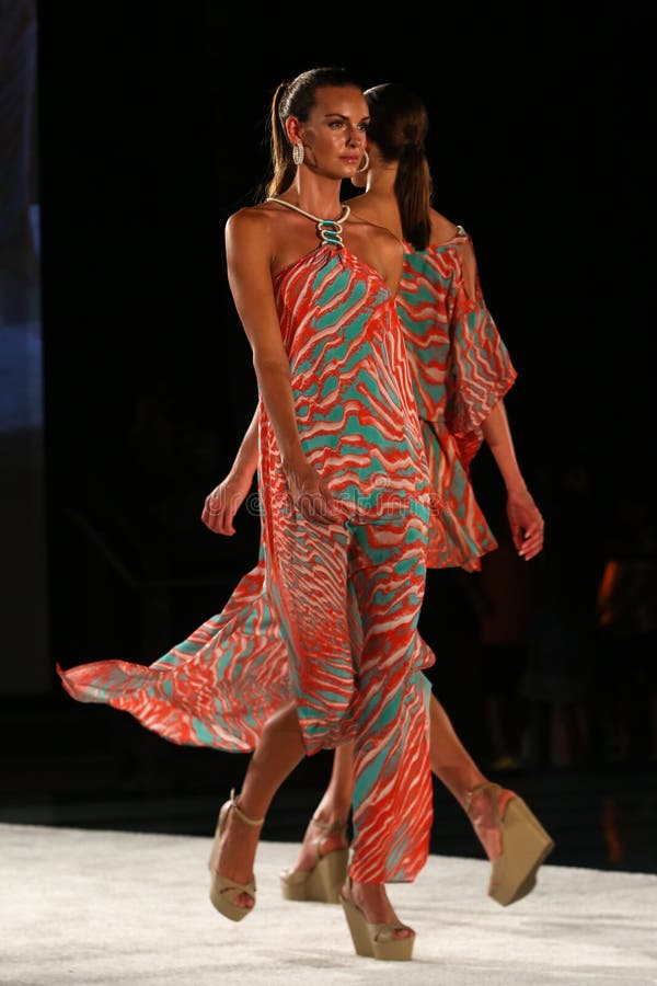 A Model Walks Runway in Designer Swim Apparel during the Caffe Swimwear ...